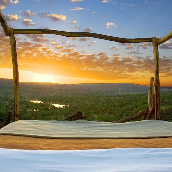 You’ll see the most spectacular sunrise right from your four-poster when staying at Loisaba Star Beds.