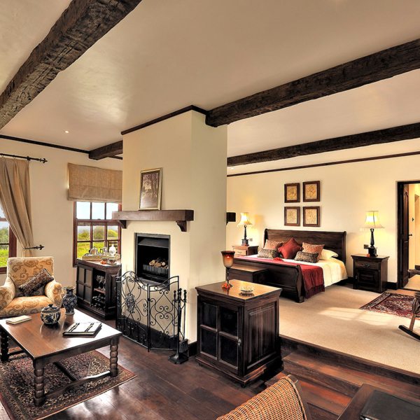 The cottages at The Manor at Ngorongoro are split into bathrooms, bedrooms and sitting rooms. © Elewana Collection