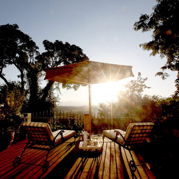 The famiy suite at The Manor at Ngorongoro has a comfortable deck. © Elewana Collection