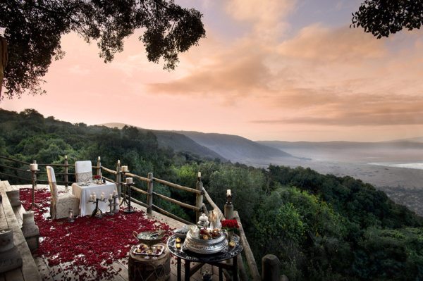 Go all out with a private rose-petal dinner at Ngorongoro Crater Lodge. © &Beyond